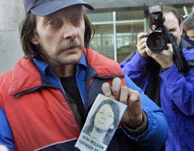 Steve Rix holds a picture of Mona Wilson, 26, in Port Coquitlam, B.C., in 2002. Wilson was named as one of the women confirmed dead during Robert William Pickton's first court appearance.
(Associated Press file photo / The Spokesman-Review)