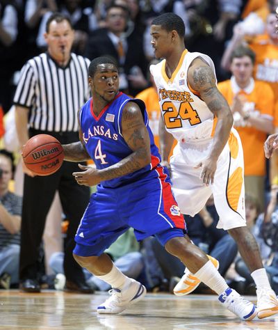 Sherron Collins’ scoring average is down as he’s focused more on distributing the ball. (Associated Press / Fr155776ap)