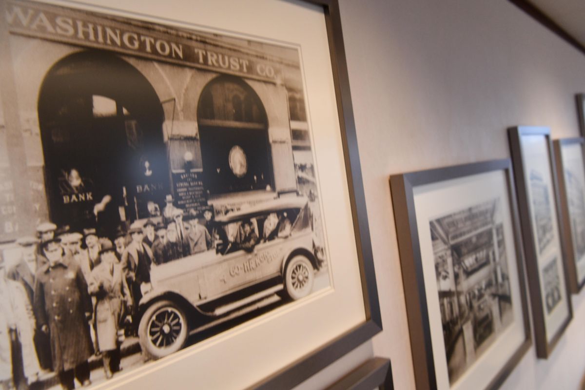 A photo displayed at Washington Trust Bank headquarters in downtown Spokane harkens to the financial institution’s earlier days. . (Tyler Tjomsland / The Spokesman-Review)