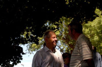 
Lieutenant governor hopeful Larry LaRocco, left, talks with state representative candidate Bob Wynhausen on Tuesday. 
 (Kathy Plonka / The Spokesman-Review)