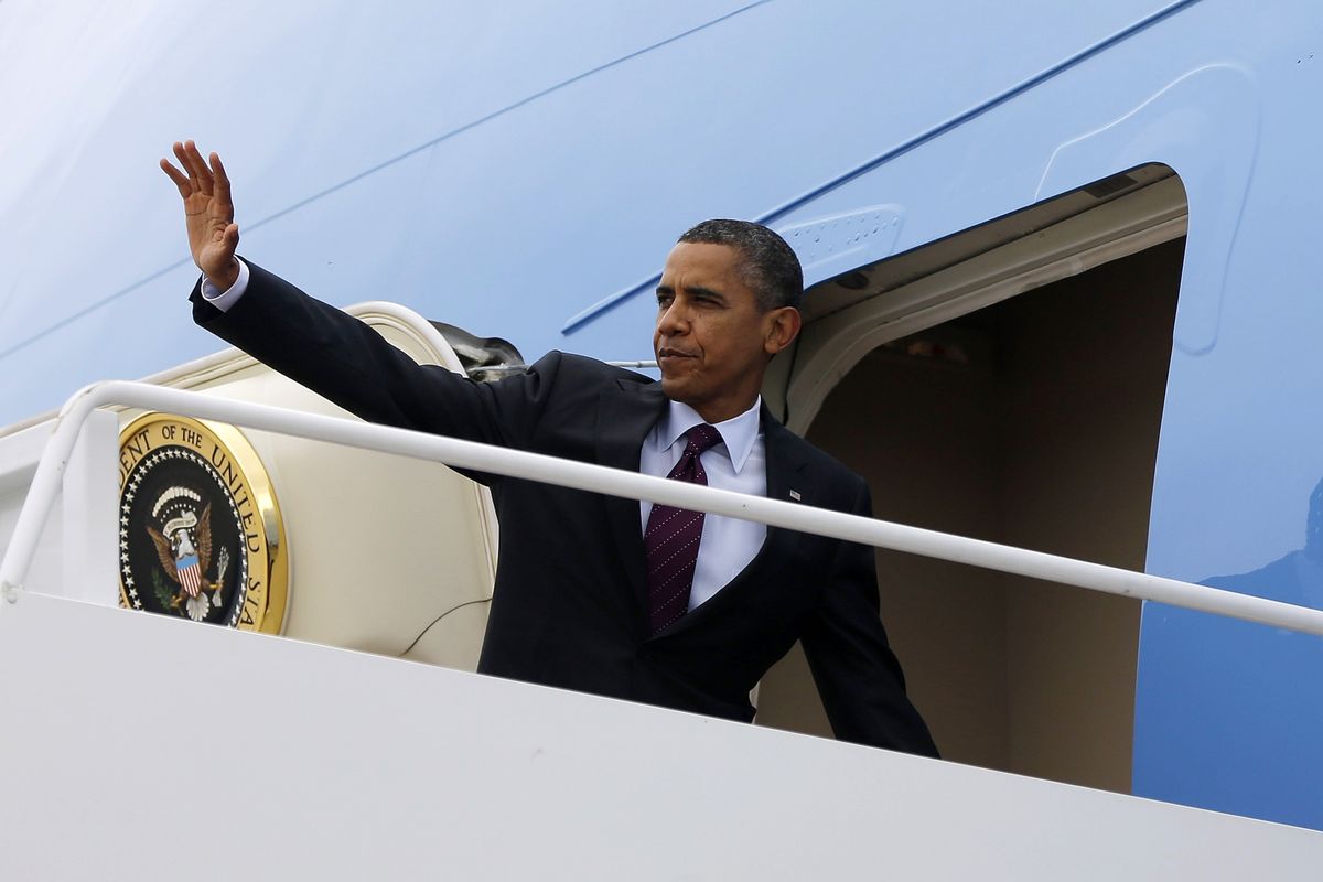President Barack Obama waves as he boards Air Force One before his departure from Andrews Air Force Base, Md., Tuesday, Sept., 4, 2012. (Pablo Monsivais / Associated Press)