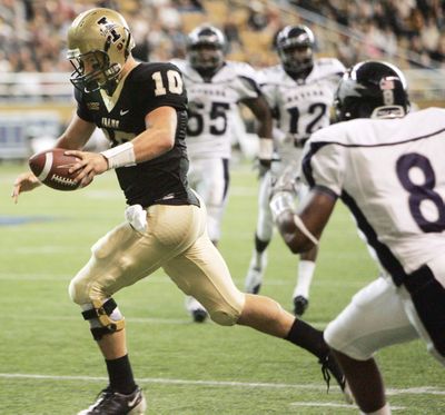 Idaho quarterback Nathan Enderle (10) scores on 12-yard run in front of Nevada safety Marlon Johnson (8) as Nevada's Dontay Moch (55) and Kaelin Burnett (12) watch during the third quarter of an NCAA college football game Saturday, Nov. 6, 2010, at the Kibbie Dome in Moscow, Idaho. Nevada won 63-17. (Dean Hare / Fr158448 Ap)