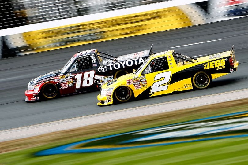 Kyle Busch (No. 18) races Kevin Harvick (No. 2) during TheRaceDayRaffleSeries.com 175 Saturday at New Hampshire Motor Speedway in Loudon, N.H. The two drivers combined to lead all by eight of the 175 laps. (Photo courtesy of Jeff Zelevansky/Getty Images) (Jeff Zelevansky / Getty Images North America)