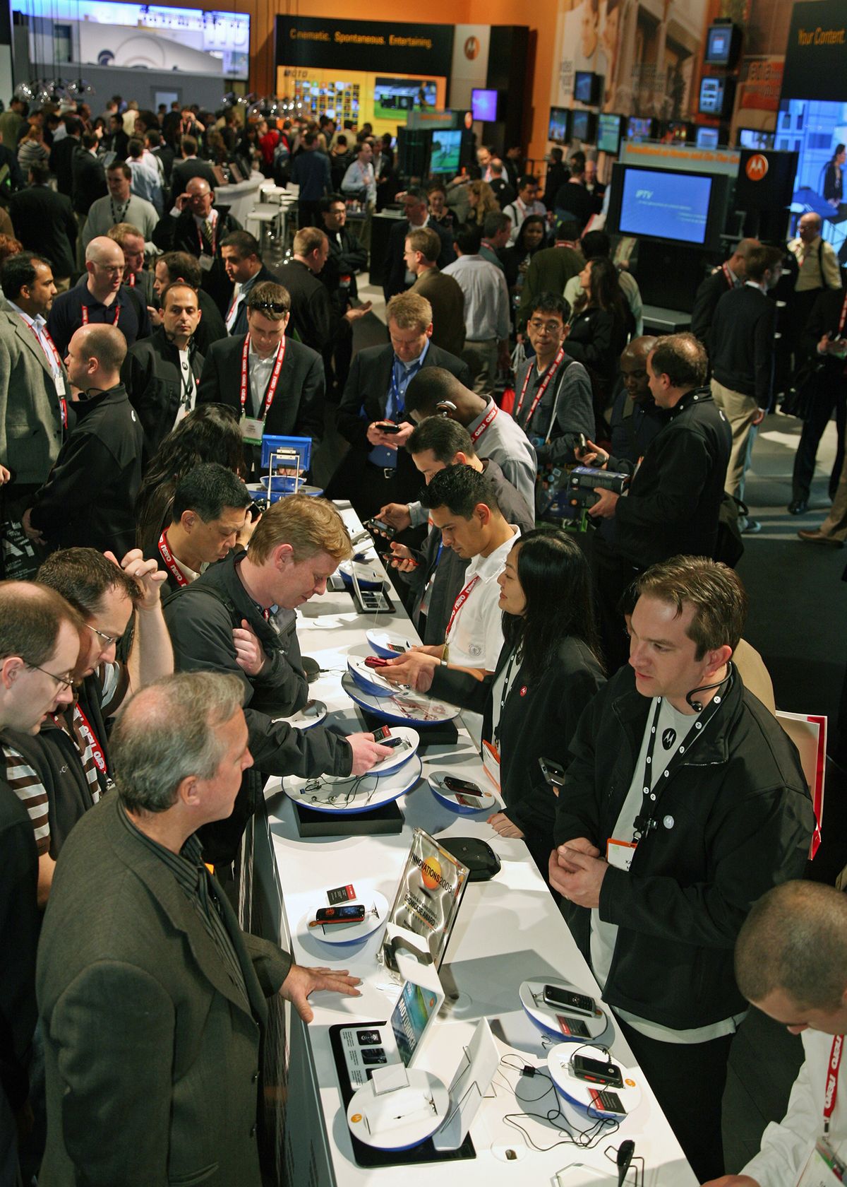 Consumer electronics industry members peruse exhibitor demonstrations of gadgets in 2008.Courtesy of International CES (Courtesy of International CES / The Spokesman-Review)