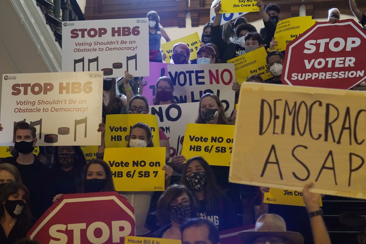 FILE - In this May 6, 2021 file photo, a group opposing new voter legislation gather outside the House Chamber at the Texas Capitol in Austin, Texas. Texas Republicans dug in Saturday, May 29, for a final weekend vote on some of the most restrictive new voting laws in the U.S., finalizing a sweeping bill that would eliminate drive-thru voting, reduce polling hours and scale back Sunday voting, when many Black churchgoers head to the polls.  (Eric Gay)