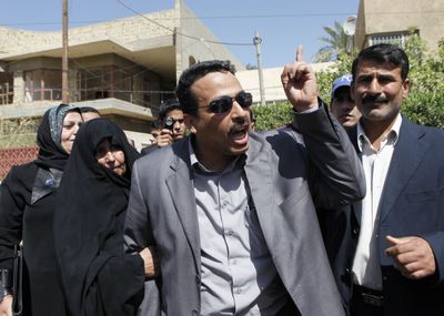Oday al-Zeidi  reacts after his brother Muntadhar al-Zeidi was  sentenced to three years in prison on Thursday.  (Associated Press / The Spokesman-Review)