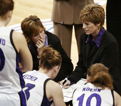 WSU coach Kamie Ethridge, left, listens to Kansas State’s Deb Patterson during an NCAA Tournament game in 2005 when Ethridge was Patterson’s assistant coach.  (Associated Press)