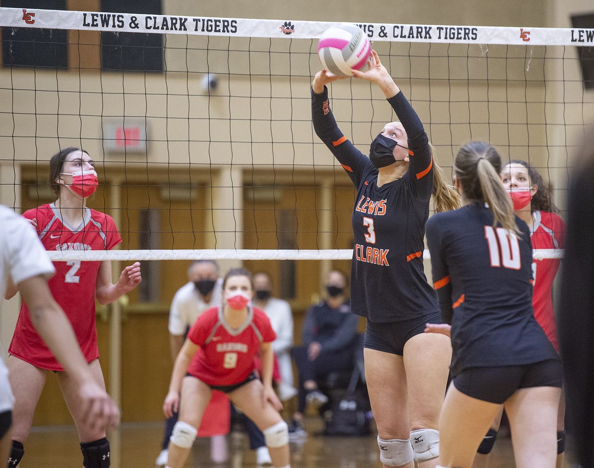 Lewis and Clark High School varsity setter Katie Henlein (3) sets a ball for teammate Gracie Reichard (10) during a game against Ferris High School at LC Tuesday, Mar. 23, 2021.  (Jesse Tinsley/The Spokesman-Review)