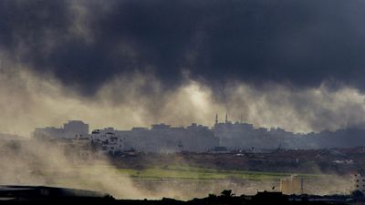 Smoke caused by explosions from Israeli military operations hangs in the sky over the outskirts of Gaza City  on Friday.  (Associated Press / The Spokesman-Review)