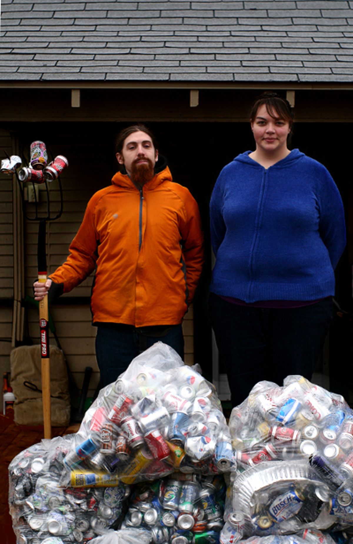 Andrea Parrish and Peter Geyer, who began collecting cans to pay for their summer wedding, are already 85 percent toward their goal of 400,000. Donations of cash and cans continue to come in from around the country.  (Courtesy photo / Courtesy photo/Yellow House Photography)