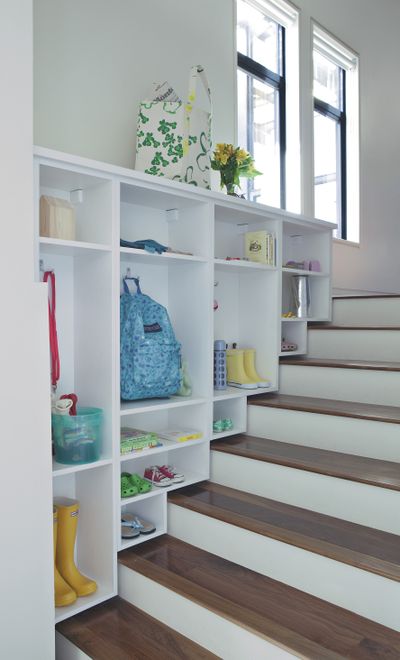 Get all the stuff out of the hall and off the floor neatly into cubbies.