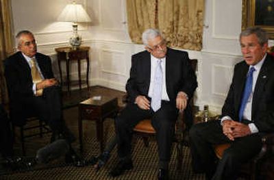 
President Bush meets with Palestinian President Mahmoud Abbas, center, and Palestinian Prime Minister Salam Fayyad at the United Nations on Monday. Associated Press
 (Associated Press / The Spokesman-Review)