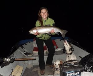 Erika Holmes holds a 29.5 inch steelhead caught on a middle Snake River impoundment while night fishing on Sept. 29, 2012. (Jeff Holmes)