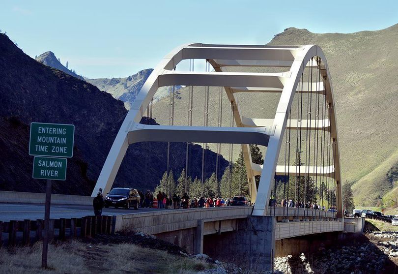 Crowds gather on Time Zone Bridge in Riggins in 2017 to watch the Salmon River Jet Boat races on the river below. The bridge marks the dividing line between the Pacific and Mountain time zones in Idaho. (Riggins Ambulance)