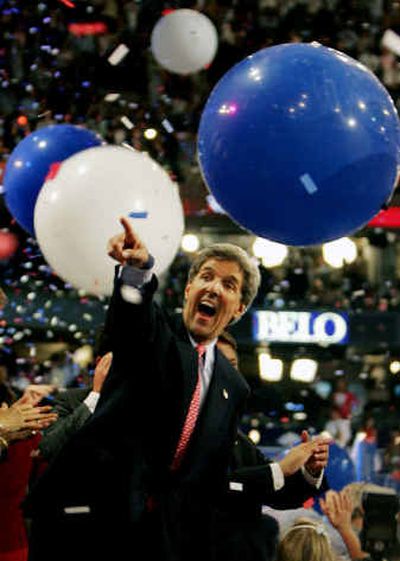 
Democratic presidential nominee John Kerry gestures after speaking to Democratic National Convention delegates on Thursday.
 (Associated Press / The Spokesman-Review)