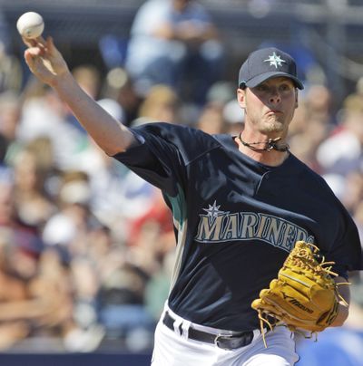 Seattle pitcher Mark Lowe has been battling diabetes as well as opposing batters.  (Associated Press / The Spokesman-Review)