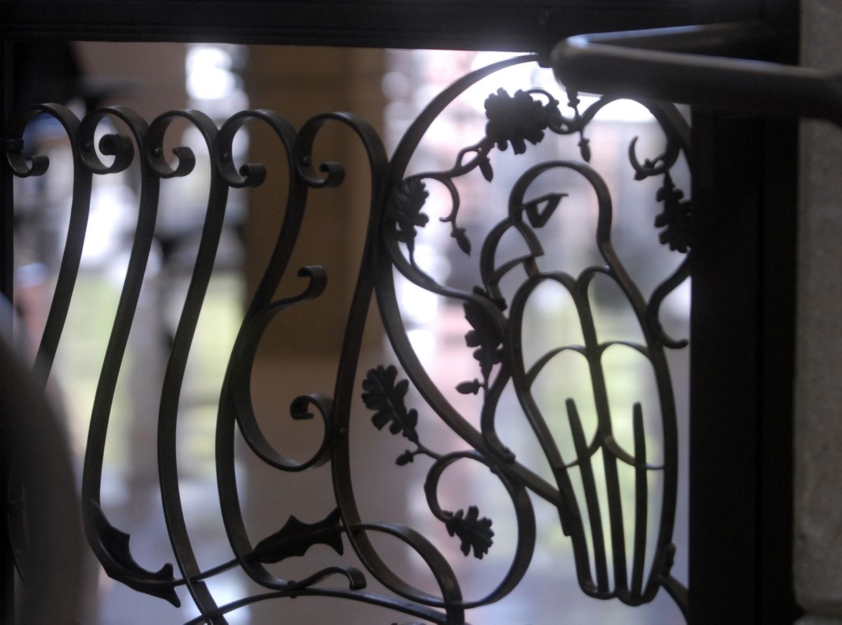 As part of the West Valley High School remodel project, the school district included a piece of art by Seattle artist Phillip Baldwin. Using wrought and fabricated mild steel and historic blacksmithing techniques, Baldwin created “Continuity,” a five-panel design that forms the stair railings of the new theater. The panels represent aspects of the human development. Above, a panel shows a bald eagle, surrounded by oak-leaf and acorn tracery, hunting for fish by a waterfall. The scene portrays courage and action and reiterates the theme of natural environment. (J. BART RAYNIAK / The Spokesman-Review)