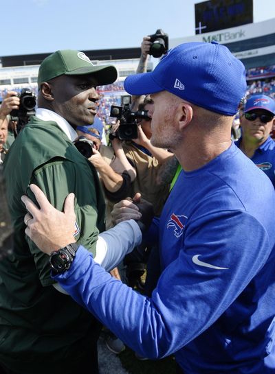 In this Sept. 10, 2017, file photo, New York Jets head coach Todd Bowles, left, and Buffalo Bills head coach Sean McDermott shake hands after an NFL football game, in Orchard Park, N.Y. The Bills have been one of the NFL’s biggest surprises of the season’s first half despite what looked like an all-out rebuild in another potentially dismal year. McDermott’s resilient squad has a chance to turn many more of the skeptics into believers on a prime-time stage against the slumping AFC East-rival New York Jets on Thursday night, Nov. 2. (Adrian Kraus / Associated Press)