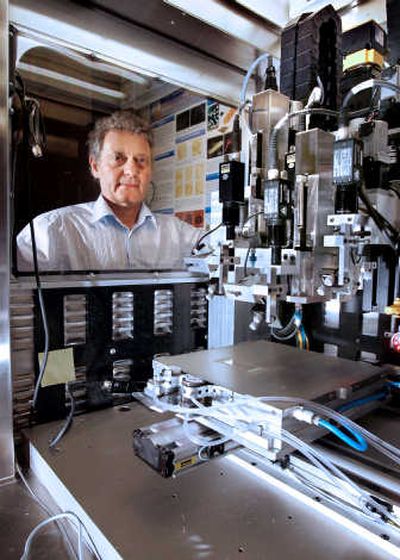 
University of Missouri-Columbia professor Gabor Forgacs uses a three-dimensional bioprinter in his research to construct living tissues.   McClatchy Tribune
 (McClatchy Tribune / The Spokesman-Review)