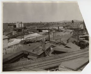 This photo, likely taken in the 1910s, shows the Howard Street bridge and the future site of the downtown YMCA in Spokane. Museum of Arts & Culture/Eastern Washington State Historical Society, Spokane. (Courtesy of Museum of Arts and Culture)