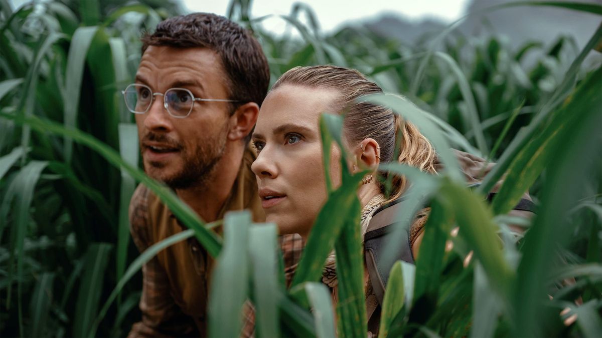 Jonathan Bailey, left, and Scarlett Johansson in “Jurassic World Rebirth.” (Universal Pictures)