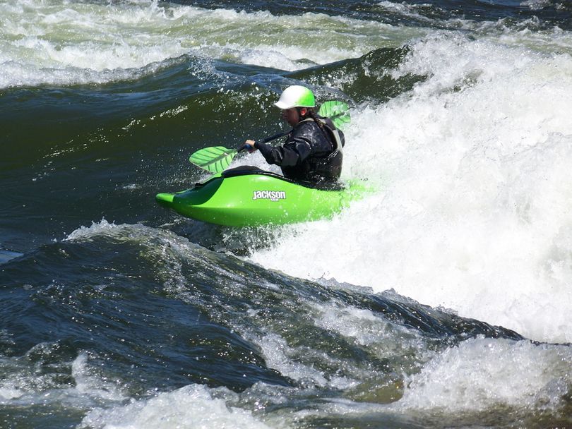 A kayaker works the waves of Kelly's Whitewater Park in Cascade, Idaho. (Devon Barker / Kelly's Whitewater Park)