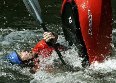 
Greg Huefner makes a splash while kayaking in the Naches River. He is part of a group seeking to build a whitewater park in the Yakima area. 
 (Associated Press / The Spokesman-Review)