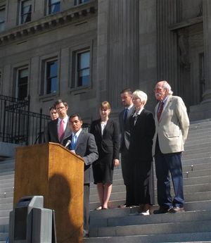 Leo Morales of the Idaho ACLU announces lawsuit over Idaho's public defender system Wednesday on the state Capitol steps (AP)