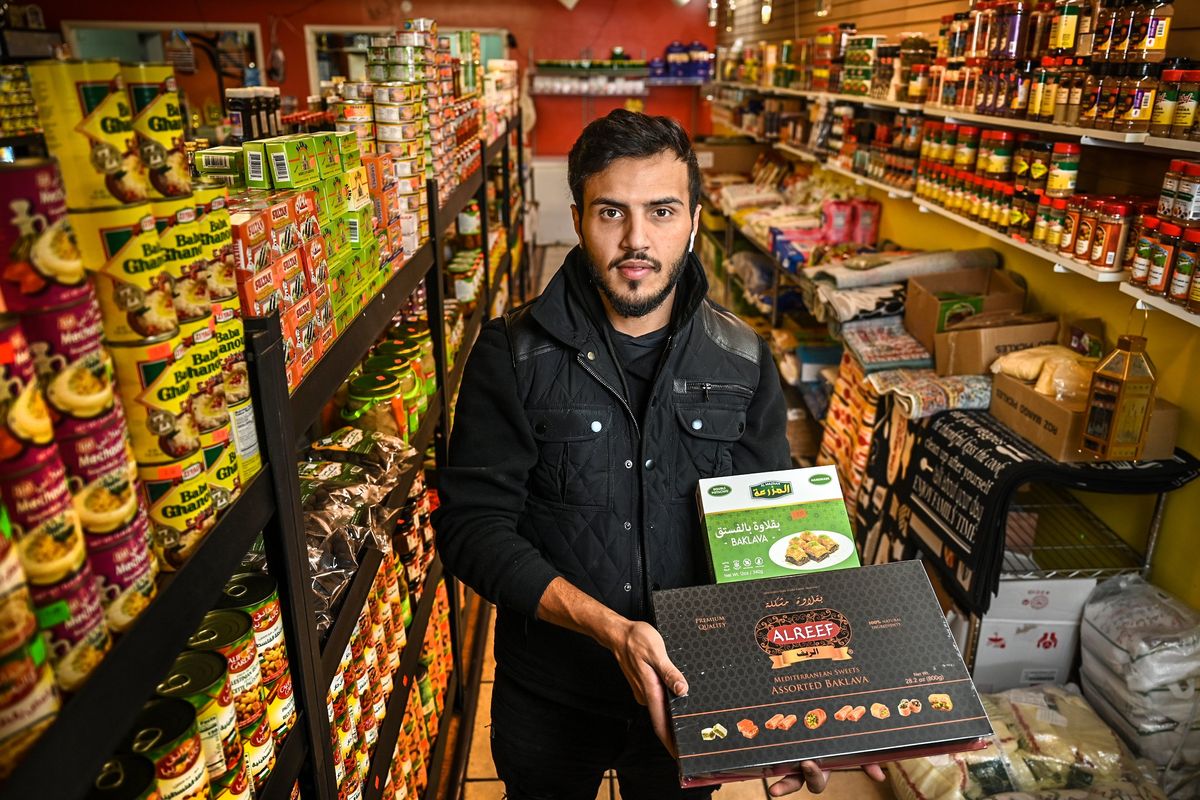 Karar Al Shamarti immigrated to the U.S. seven years ago and graduated from Ferris High School in 2020. Four months ago, he bought the space formerly occupied by Miriam International Foods and opened Karar Market. In addition to Middle Eastern foods and spices, he stocks traditional fresh-baked cookies, incense and blankets.  (DAN PELLE/THE SPOKESMAN-REVIEW)