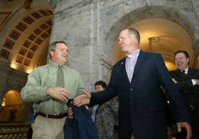 
Spokane's Ryne Sandberg, right, greets former North Central  teammate Marty Hare at the Washington Statehouse, where he was being honored by both the Senate and House.
 (John Froschauer/Special to / The Spokesman-Review)