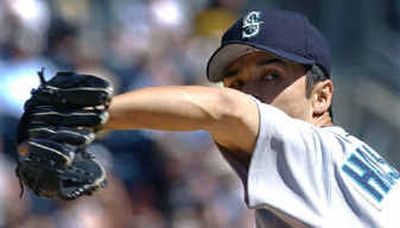 
M's reliever Shigetoshi Hasegawa made things interesting in the seventh. 
 (Associated Press / The Spokesman-Review)