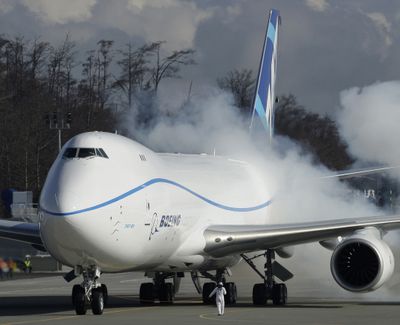 Engines on the Boeing 747-8 freighter are started just prior to the plane’s first flight in Everett on Feb. 8, 2010. (Associated Press)