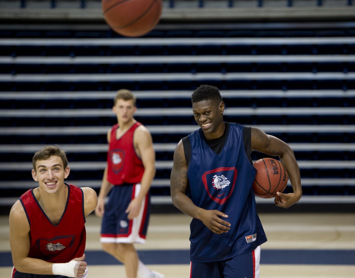 Gonzaga guards David Stockton, left, and Gary Bell Jr., right, are all smiles at the Bulldogs’ first practice of the season. (Tyler Tjomsland)