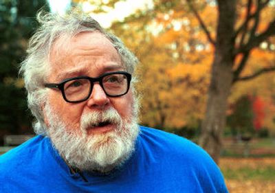 
 Harvey Manning poses in a park near Issaquah, Wash., in 2000. 
 (File Associated Press / The Spokesman-Review)