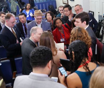 A “gaggle” of reporters line up in hopes of attending a briefing in Press Secretary Sean Spicer's office at the White House in Washington, Friday. (AP Photo/Pablo Martinez Monsivais)