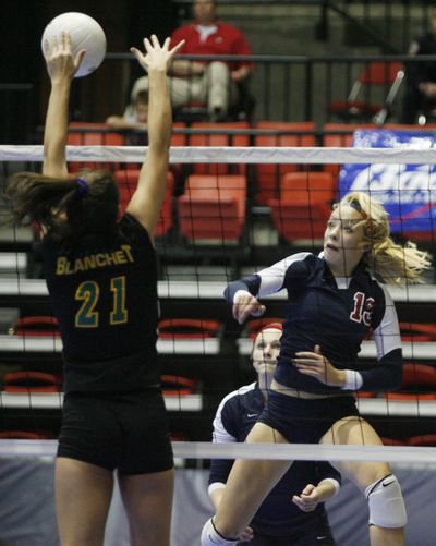 Bishop Blanchet’s Abby Smith blocks a shot by Mount Spokane’s Ixchelle Oleson. Tri-City Herald (Kai-Huei Yau Tri-City Herald)