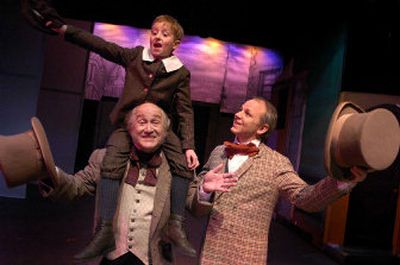 
Tiny Tim, played by Keith Hahto, sits on the shoulders of Scrooge (Dennis Craig) in the Spokane Civic Theatre's production of 