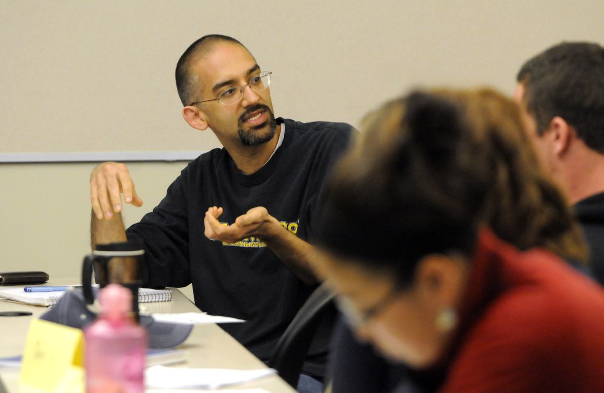 Professor Vikas Gumbhir participates in a discussion among students in Professor Molly Pepper’s hate studies class at Gonzaga University on Tuesday. (Jesse Tinsley / The Spokesman-Review)