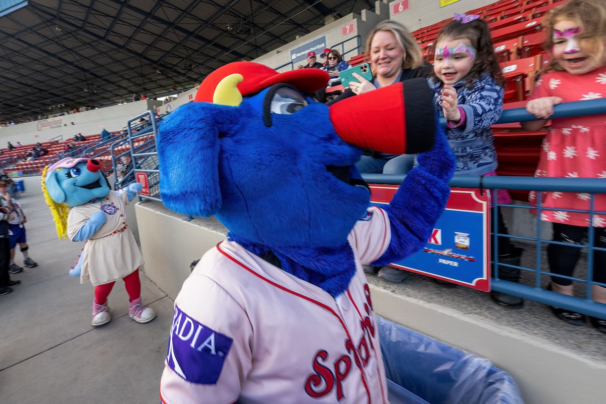 Spokane Indians mascots Doris, on left, and Otto greet young fans during the team’s Fan Fest held Wednesday, April 6, 2022, at Avista Stadium.  (COLIN MULVANY/THE SPOKESMAN-REVI)