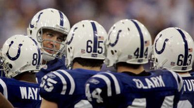 
Peyton Manning, top, and the Colts taste defeat for the first time in 2005.
 (Associated Press / The Spokesman-Review)