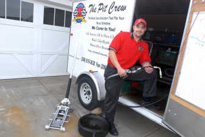
Ryan Rock Wells operates The Pit Crew, a mobile auto servicing business. He will go to your car, change the oil and other fluids whereever your car is parked. 
 (Jesse Tinsley / The Spokesman-Review)