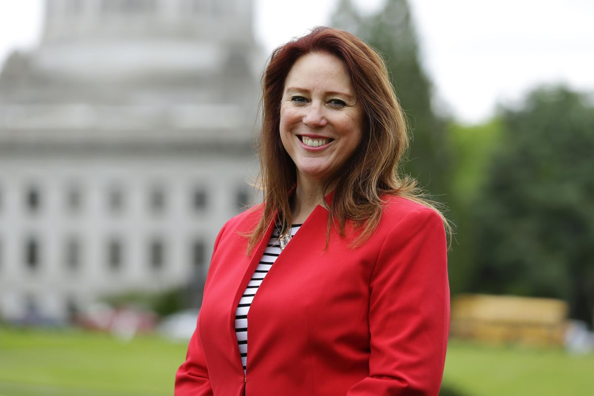 In this May 4, 2016 file photo, Washington Secretary of State Kim Wyman poses at the Capitol in Olympia, Wash. A proposal supported by Wyman would include separate lists both party’s candidates, plus an alphabetized list of all candidates of both parties. (Ted S. Warren / AP)