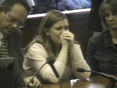 
Sarah Johnson awaits the verdict in her trial Wednesday at the Ada County Courthouse in Boise in this image from video.  
 (Associated Press / The Spokesman-Review)