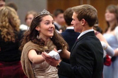 
Lindsey Ingalls,  16, and Jon Hyatt,  15, dance a fox trot Thursday at the annual Winter Ball – put on by  the local chapter of the National Association of Junior Cotillions –  at St. Pius X Catholic Church in Coeur d'Alene. The program teaches ballroom dancing and old-fashioned etiquette to young people.
 (Photo by JESSE TINSLEY / The Spokesman-Review)