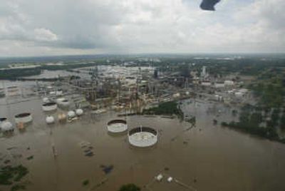 
Floodwaters swamp the Coffeyville Resources Refinery in Coffeyville, Kan., on Monday, sending oil downstream.Associated Press photos
 (Associated Press photos / The Spokesman-Review)