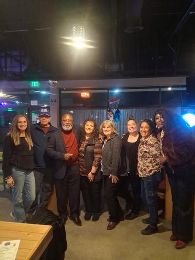 Earon Davis, third from left, is retiring after 56 years as a local Safeway employee.  (Courtesy)