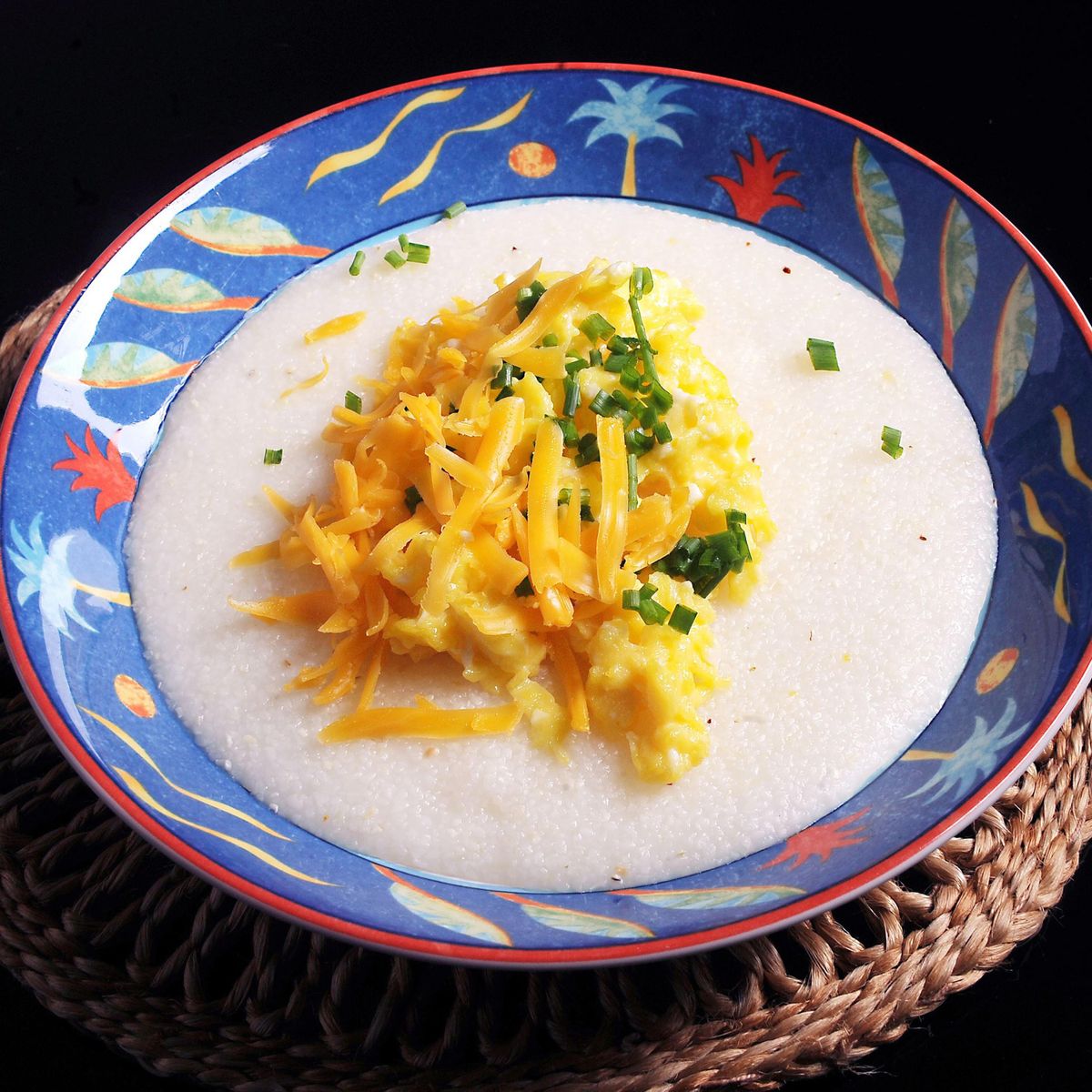 Grits with cheddar cheese, chives and scrambled eggs. (Nate Guidry / Pittsburgh Post-Gazette)