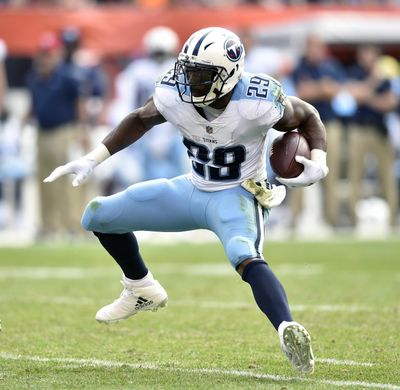 In this Oct. 22, 2017, file photo, Tennessee Titans running back DeMarco Murray (29) runs with the ball during an NFL football game against the Cleveland Browns, in Cleveland. DeMarco Murray is retiring from the NFL. The 2014 Offensive Player of the Year made the announcement on ESPN on Friday, July 13, 2018, four months after being released by the Titans. (David Richard / Associated Press)