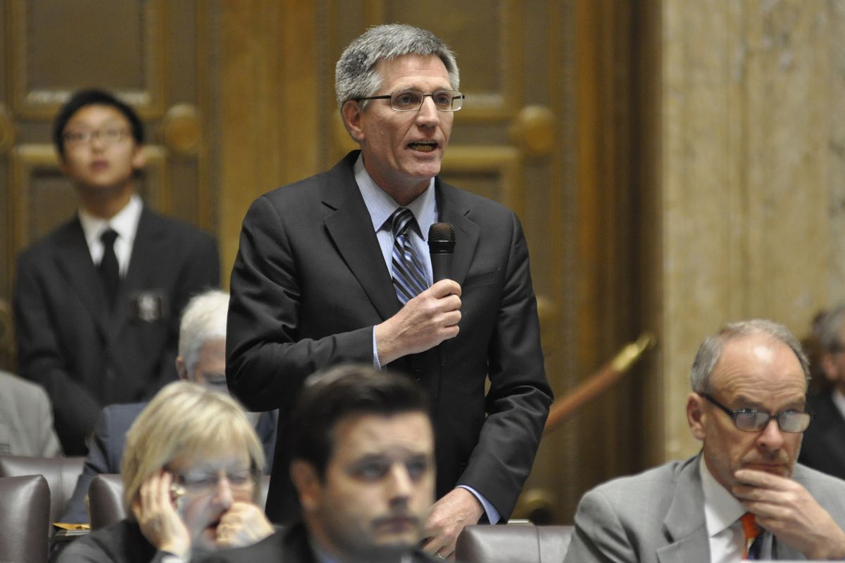Rep. Timm Ormsby, D-Spokane,  introducing the Sheena Henderson Act on family notification of gun returns on the House floor Wednesday, April 8, 2015, where it passed unanimously.  (Jim Camden)