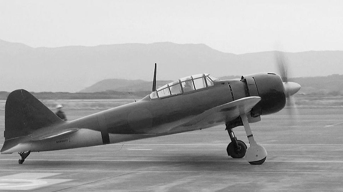 A restored MitsubishiZero fighter, piloted by Skip Holm, a former U.S. Air Force pilot, prepares to take off at an air station in Kanoya, Kagoshima prefecture, southern Japan, Wednesday. (Associated Press photos)